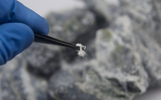 Close-up of asbestos fibres extracted from a material sample during a professional asbestos survey in Surrey